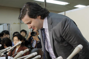 Disgraced Mt. Gox CEO, Mark Karpeles, bows before declaring bankruptcy.