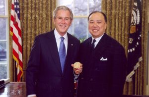 Ed Moy posing for a photo with President George W. Bush